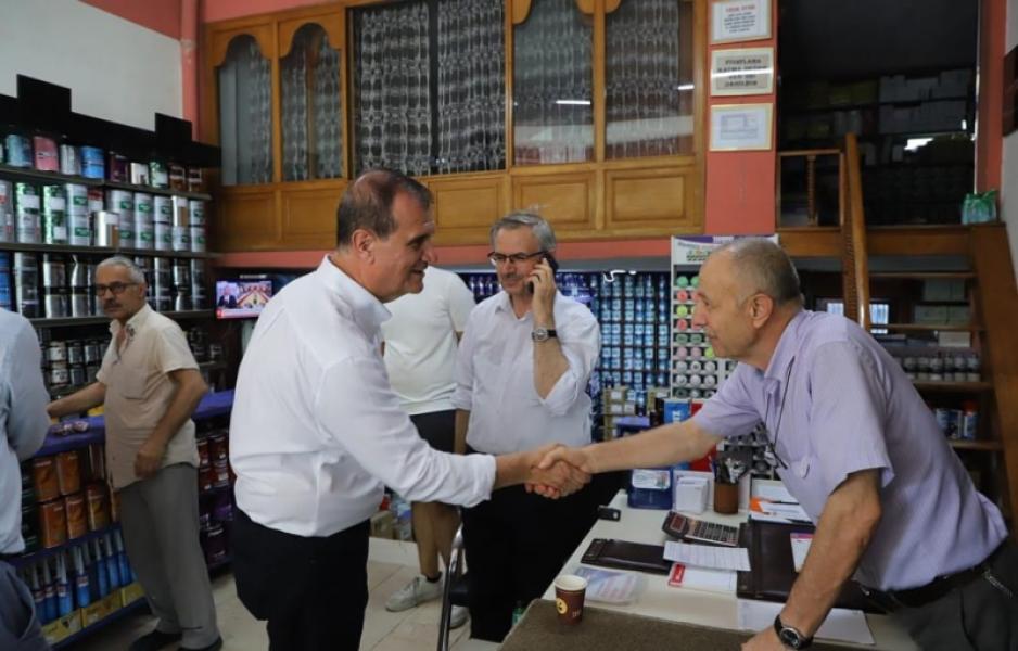 Visites chez les commerçants locaux et réunions sur site